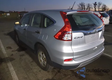 2015 Honda Cr-V Lx z USA, uszkodzony, nr VIN 2HKRM4H37FH696580